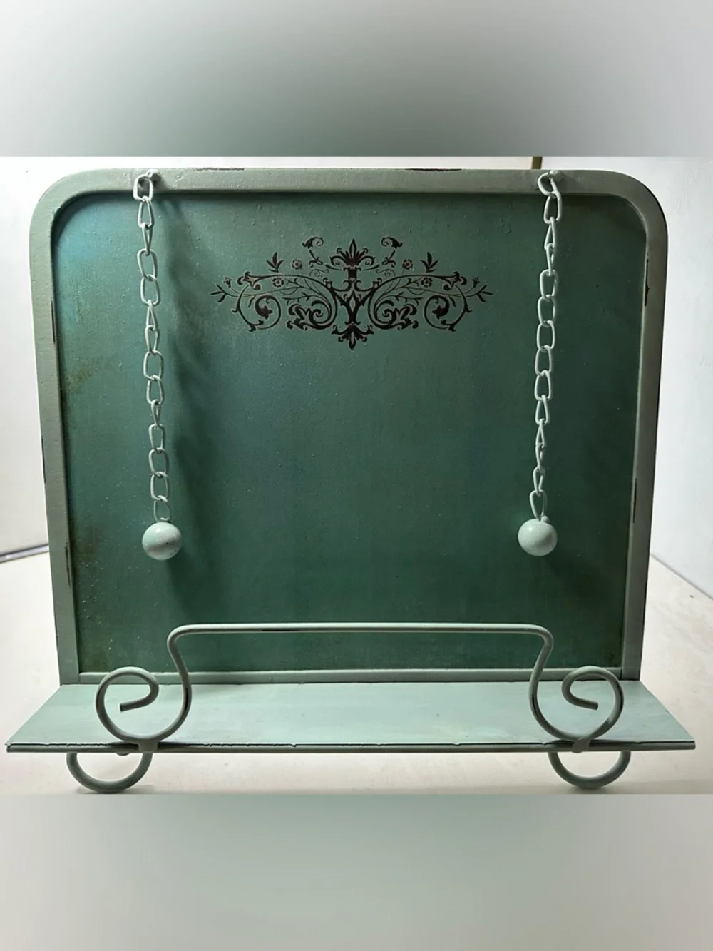 Kimberly Poloson stylish aqua